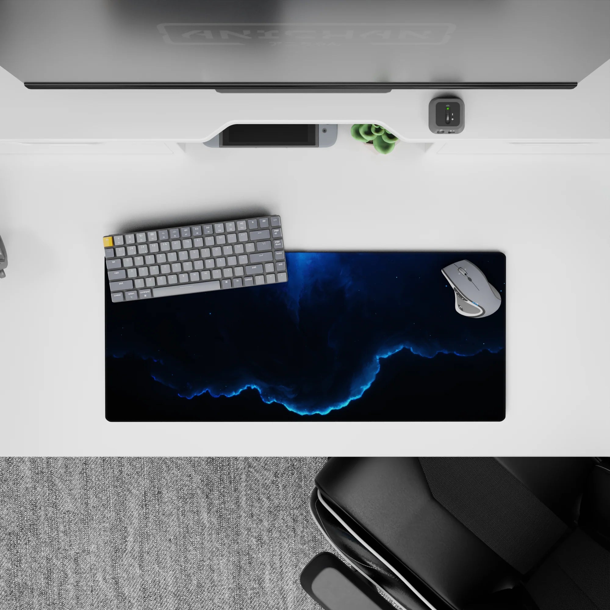 Moody deep navy and smoky blue desk mouse pad with calm stormy glow, 28x12 inches.