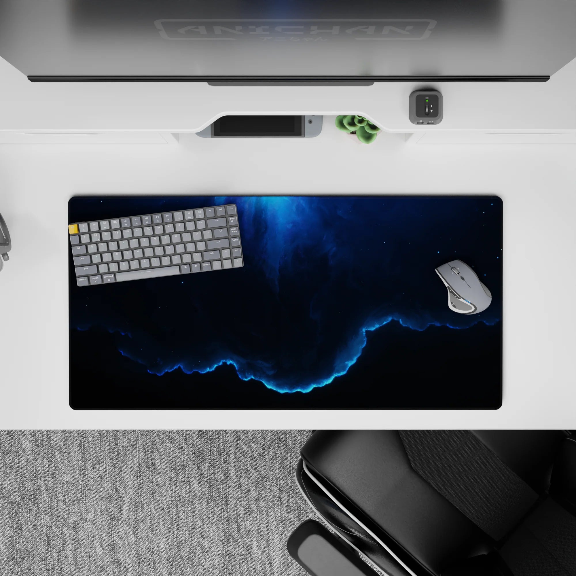 Moody navy and smoky gradient mouse pad, 32x16 inches, calm cosmic vibe with an electric blue edge.
