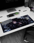 Dark-haired ruby-eyed anime girl with roses, holding a tiny flower to her lips on a 36x16 inches desk pad.