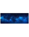 Midnight galaxy desk mouse pad 32x12 inches with star-speckled navy clouds and smooth surface.