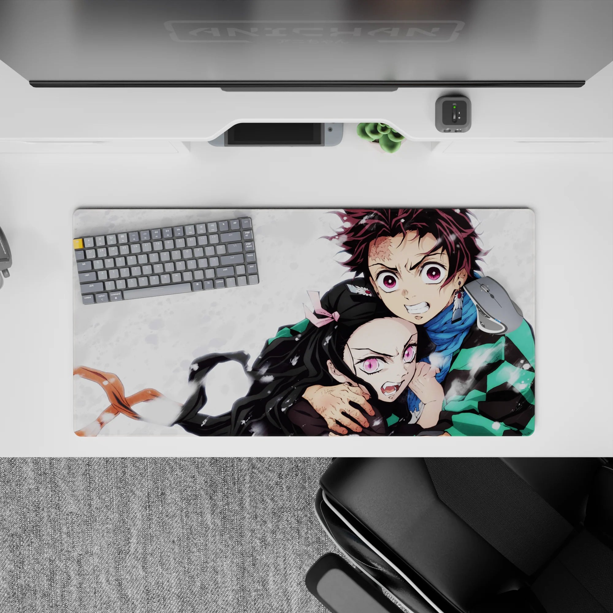 Tanjiro and Nezuko Demon Slayer anime mouse pad, 32x16 inches, featuring intense sibling bond and vibrant pink eyes.