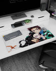 Mouse pad featuring Tanjiro and Nezuko from Demon Slayer, size 32x16 inches, showcasing sibling power and fierce loyalty.