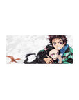 Tanjiro and Nezuko on a 28x12 inches anime mouse pad, showcasing Demon Slayer's sibling bond and fierce protection.