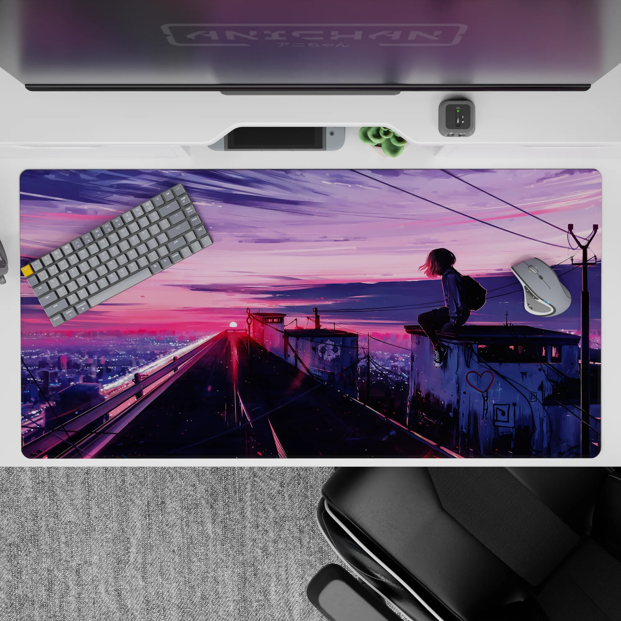 Neon pink to violet sunset mood anime desk pad 40x20 inches, calm late-night city glow.