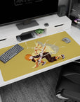 Zenitsu mid-strike on a 40x20 inch Demon Slayer anime desk pad with lightning, yellow haori, and golden background.