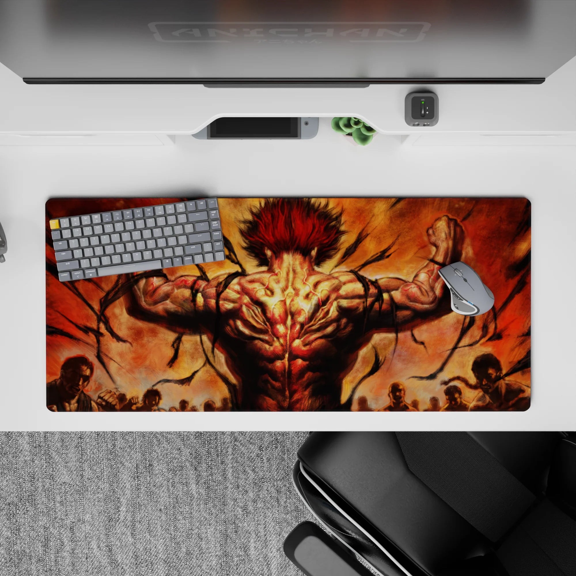 36x16 inches anime desk pad in smoky orange and black, fiery muscle glow, loud high-energy battle mood.
