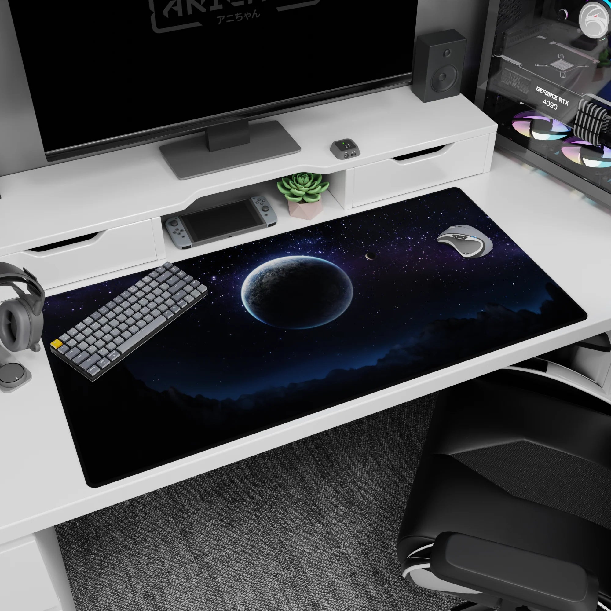 Large 40x20 inch desk pad with a midnight sky design featuring stars, soft nebula haze, and distant peaks.