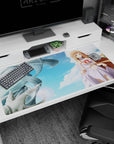 Asuna from Sword Art Online in flowing dress with red bow on anime girl desk pad 40x20 inches.