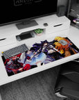 Ruby, Weiss, Blake, and Yang facing forward with angled weapons on clean white desk pad, 36x16 inches.