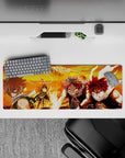 32x12 inches anime mouse pad with fiery orange palette, rolling flames, sharp shadows, and intense energy.