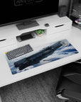 Spaceship gliding above a blue ice planet on desk mouse pad 32x12 inches, crisp panel details and haze.