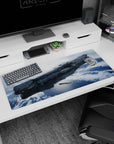 Steel-gray starship drifting above an icy blue planet desk pad 36x16 inches for space-themed setups.