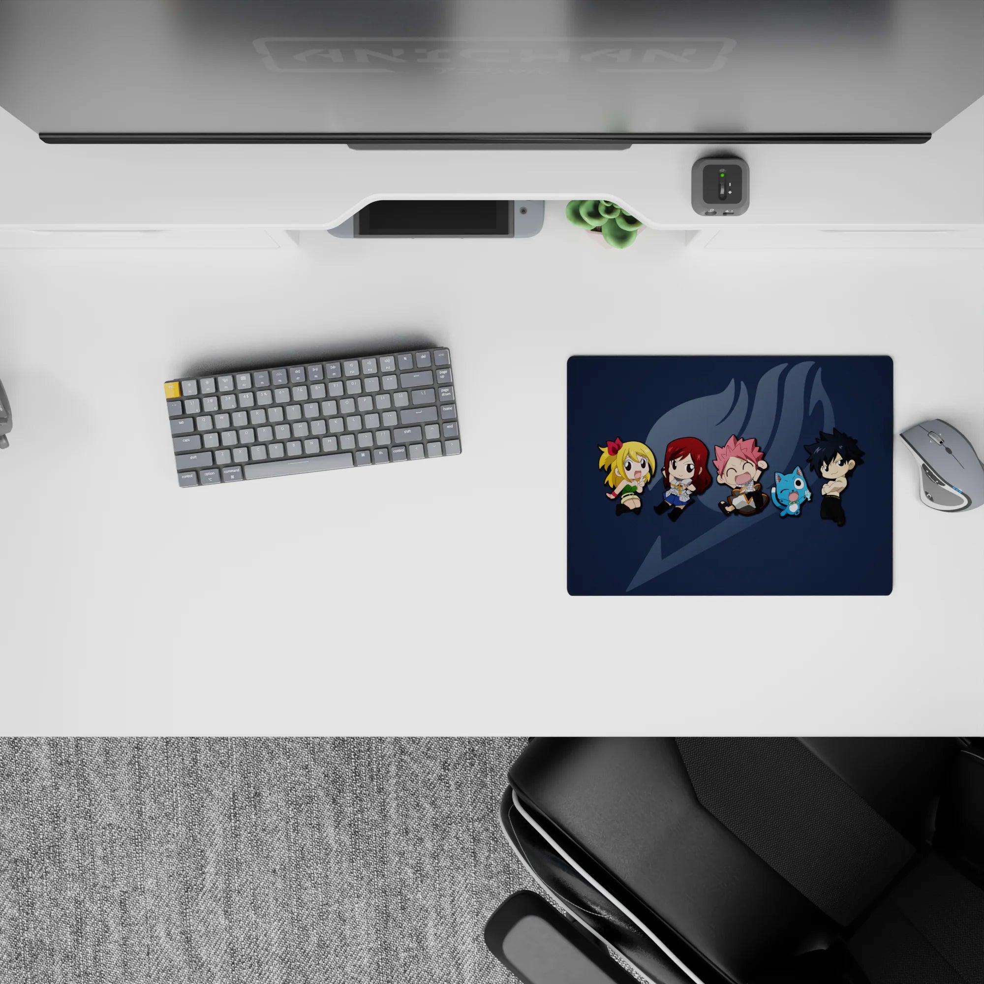 Deep navy anime mouse pad with soft gray emblem and bright chibi colors, 14x10 inches.