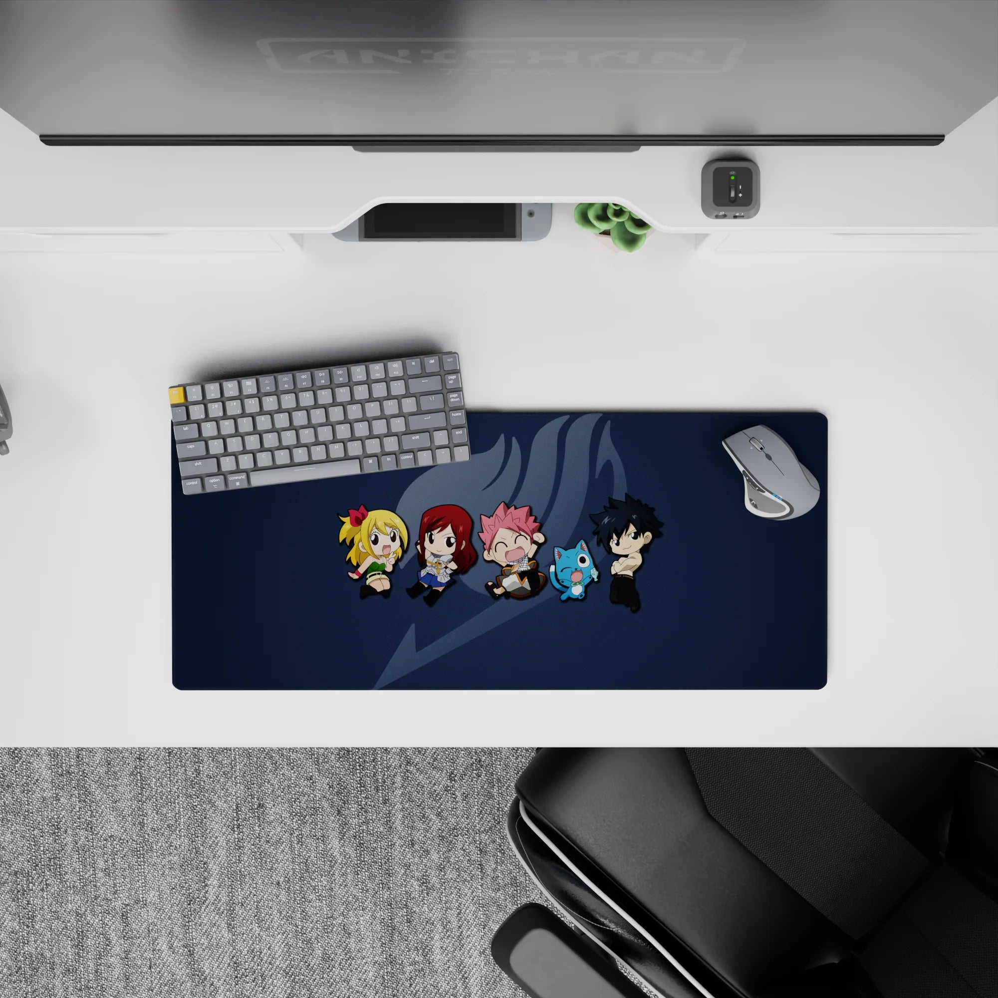 Deep navy anime mouse pad 28x12 inches with bright chibi lineup and soft gray guild mark.