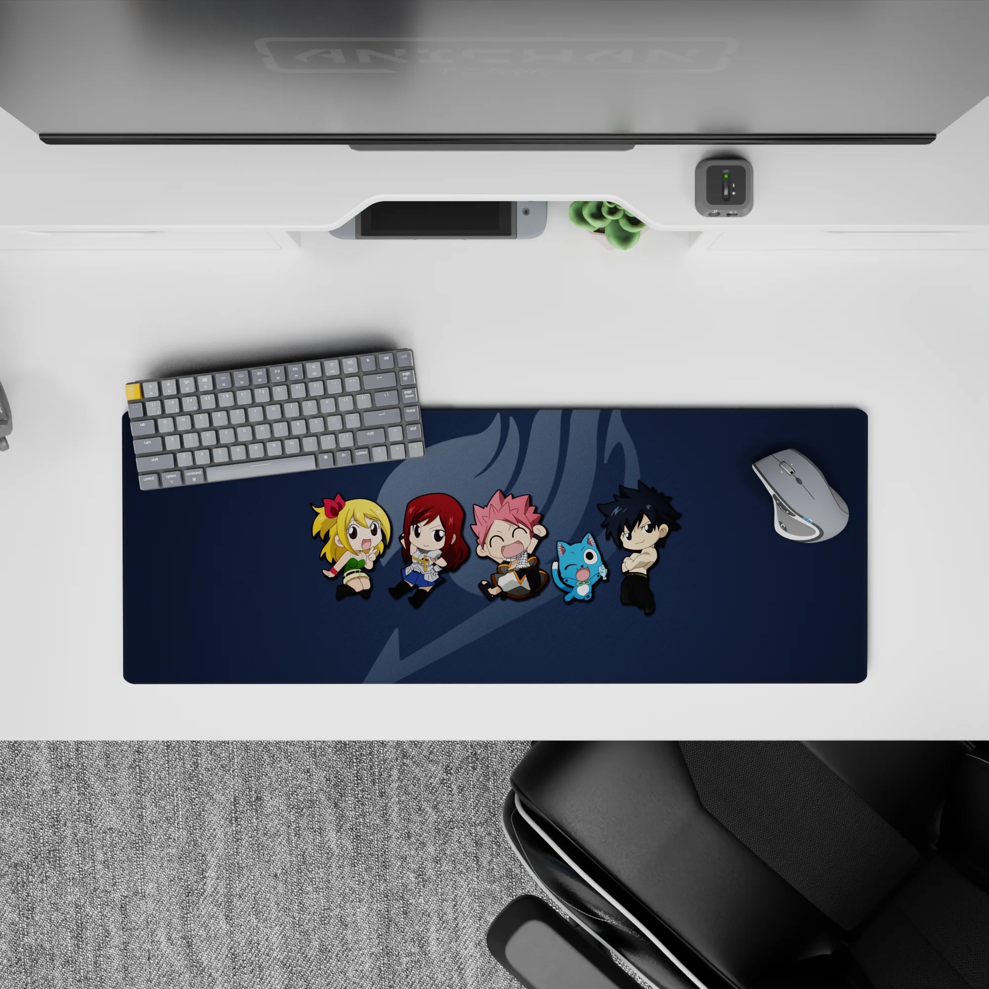 Deep navy anime mouse pad 32x12 inches with soft gray guild mark and bright chibi characters.