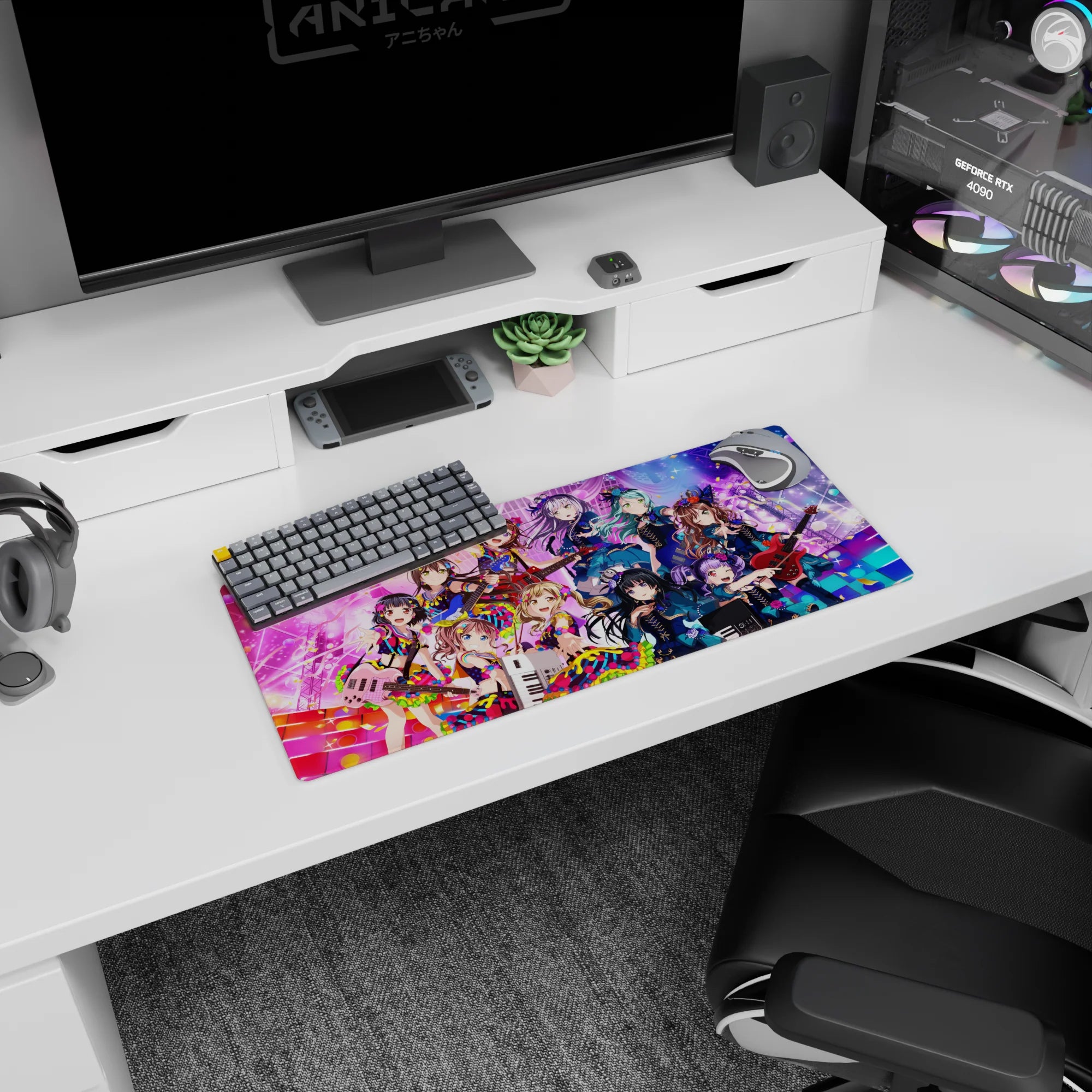28x12 inches anime girl mouse pad showing wide-eyed idol winking, rose hair clip, reaching hands, confetti.