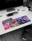 Wide-eyed anime idol girl winking on mouse pad 32x12 inches, reaching out amid ribbons and keytar.