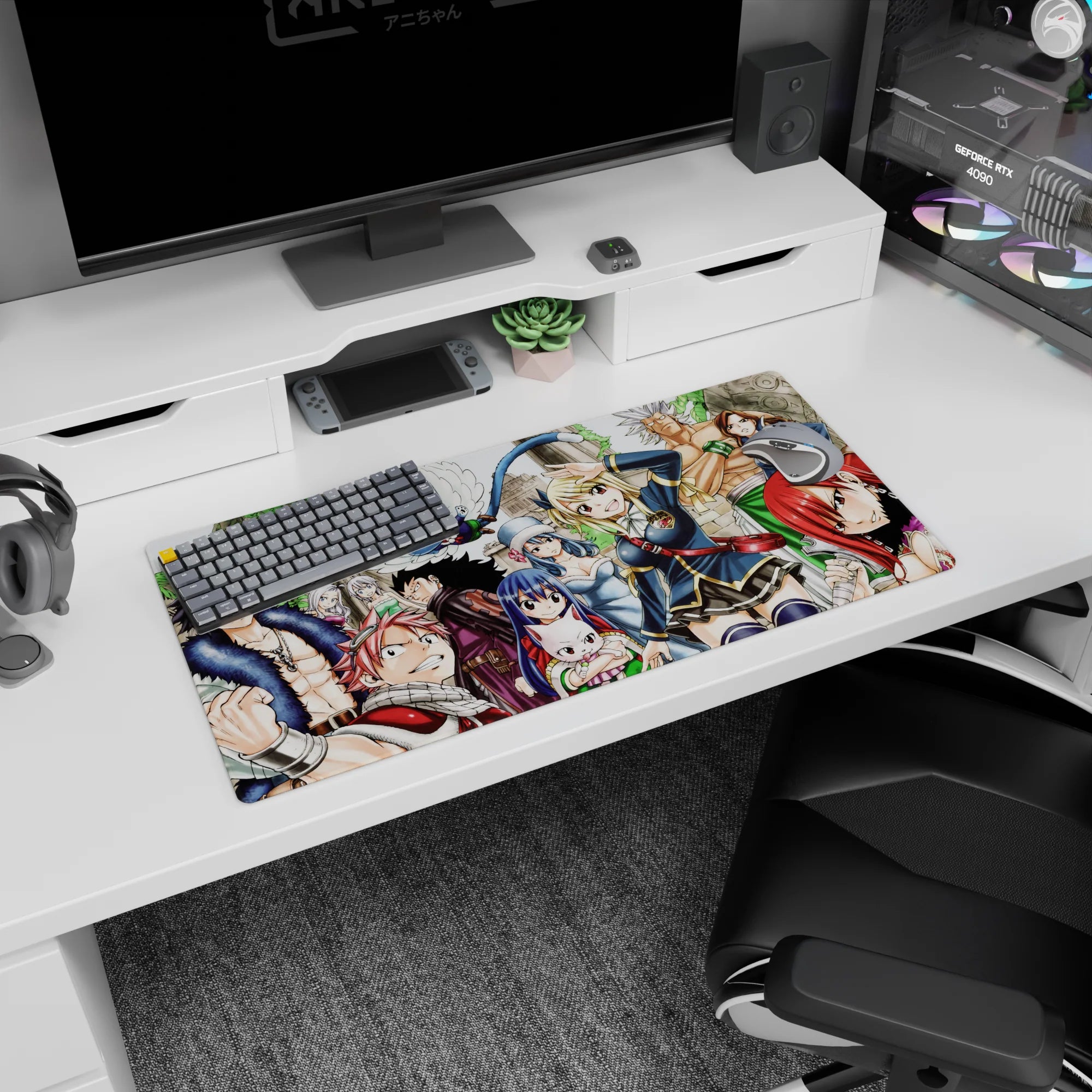 Natsu and Lucy front-and-center on a Fairy Tail anime mouse pad 32x16 inches, Erza and Happy above.
