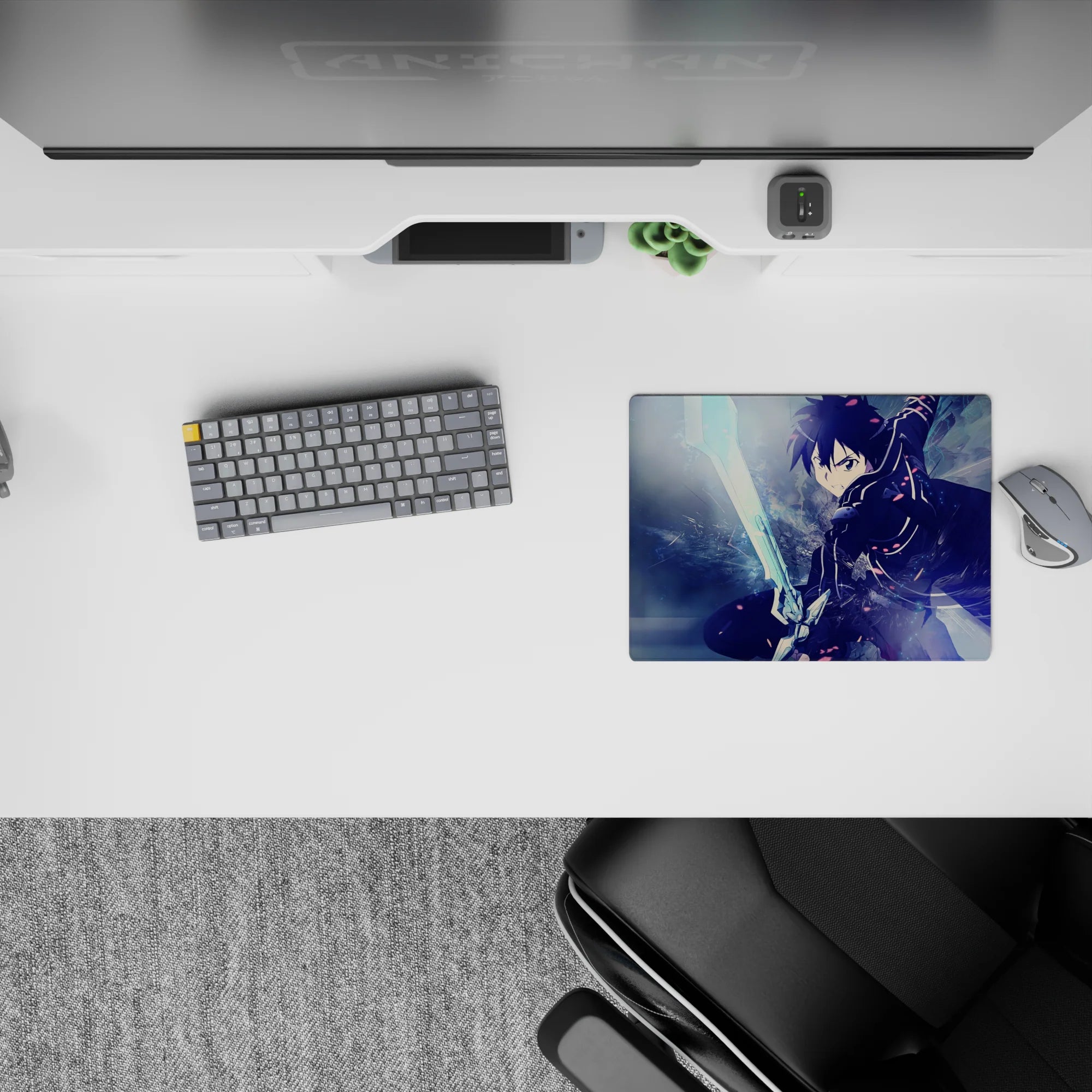 Anime mouse pad 14x10 inches featuring Kirito in action, surrounded by icy blues and electric glints in a dramatic scene.