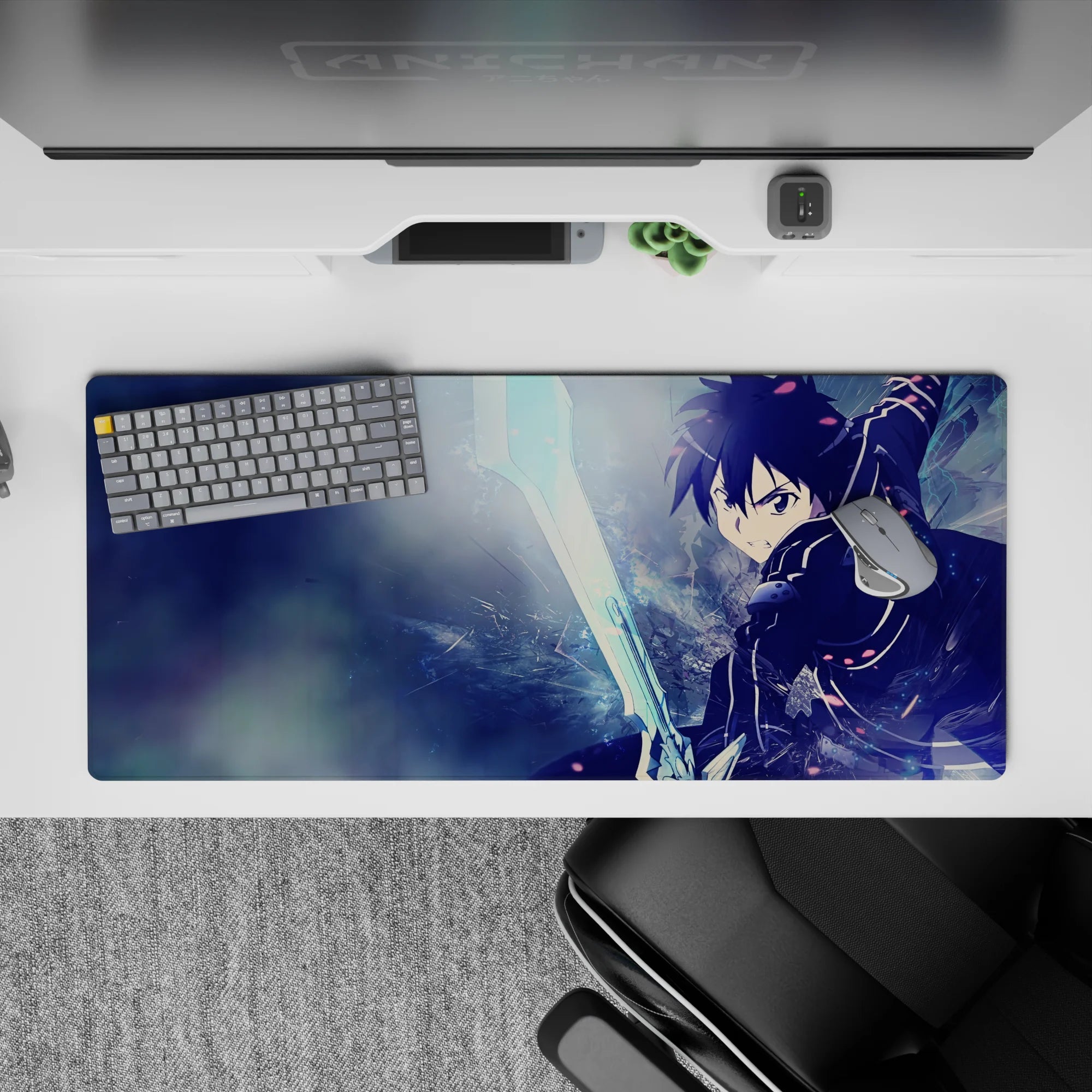 Anime desk pad featuring Kirito from Sword Art Online, 36x16 inches. Dynamic icy blues and electric glints capture action.