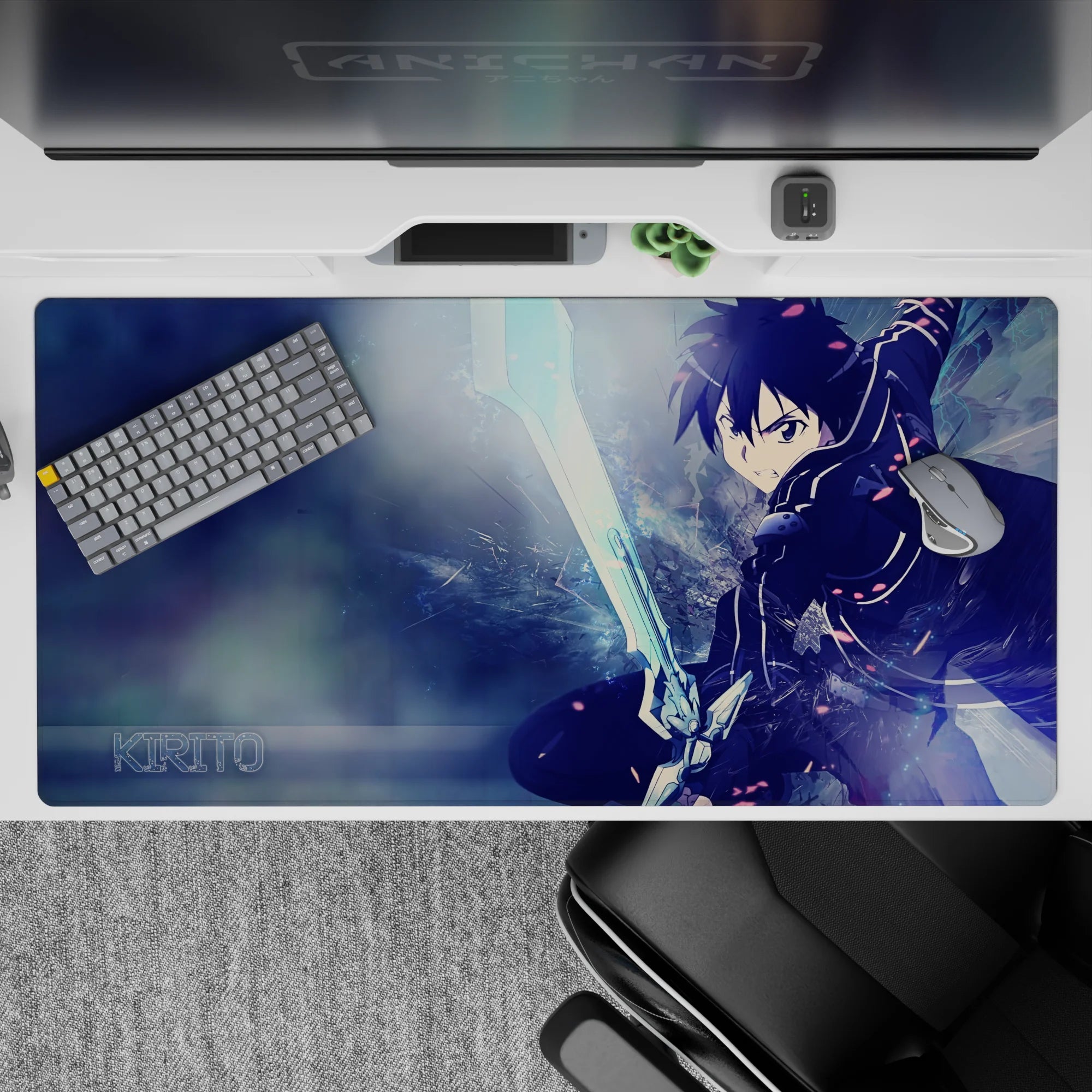Kirito from Sword Art Online on a 40x20 inch anime desk pad, showcasing dynamic motion with icy blues and electric details.