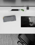 Moody grayscale anime girl mouse pad 14x10 inches, charcoal-to-mist fade with thin red line drama.