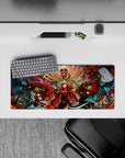 28x12 inches anime girl mouse pad in fiery red and smoky black with teal sparks and gold fan patterns.