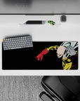 32x12 inches anime mouse pad in deep black with bright yellow suit and glossy red gloves, intense action vibe.