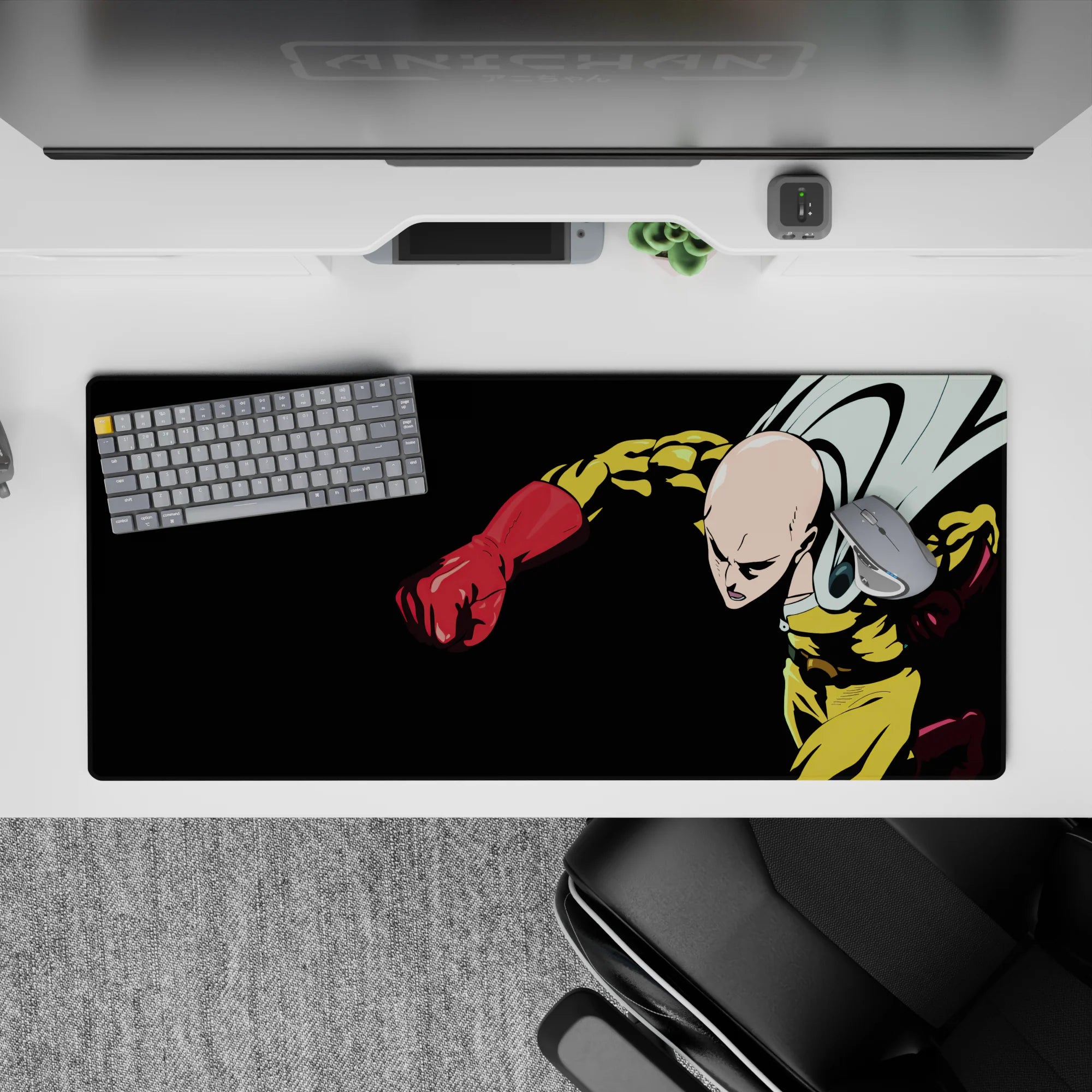 36x16 inches anime desk pad in black, yellow, and red with stormy cape energy and sharp graphic contrast.