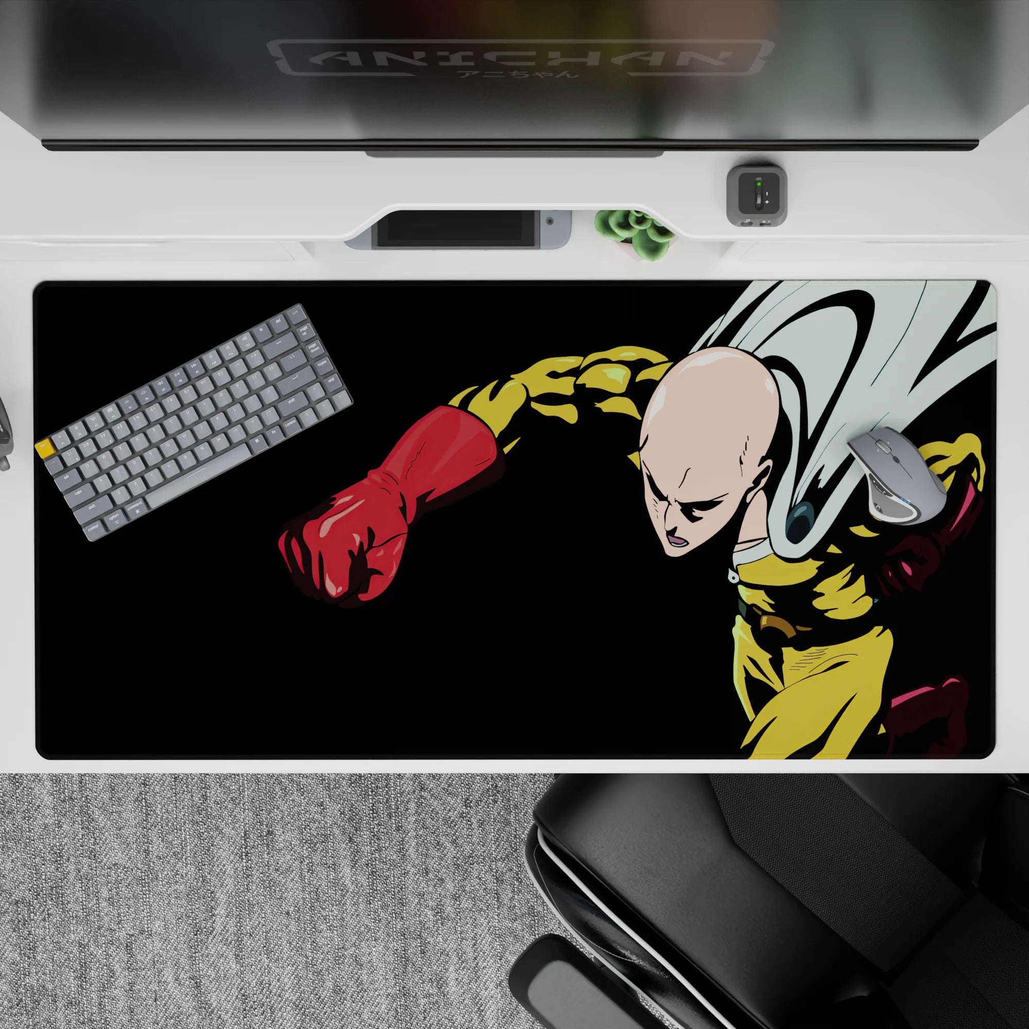 Black backdrop, bold yellow suit and red gloves anime desk pad 40x20 inches with stormy cape vibe.
