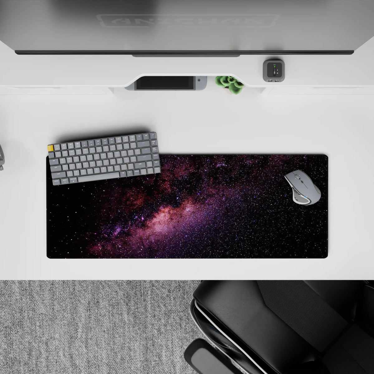 Calming purple and blush nebula on inky black 32x12 inches mouse pad with stardust sparkle.