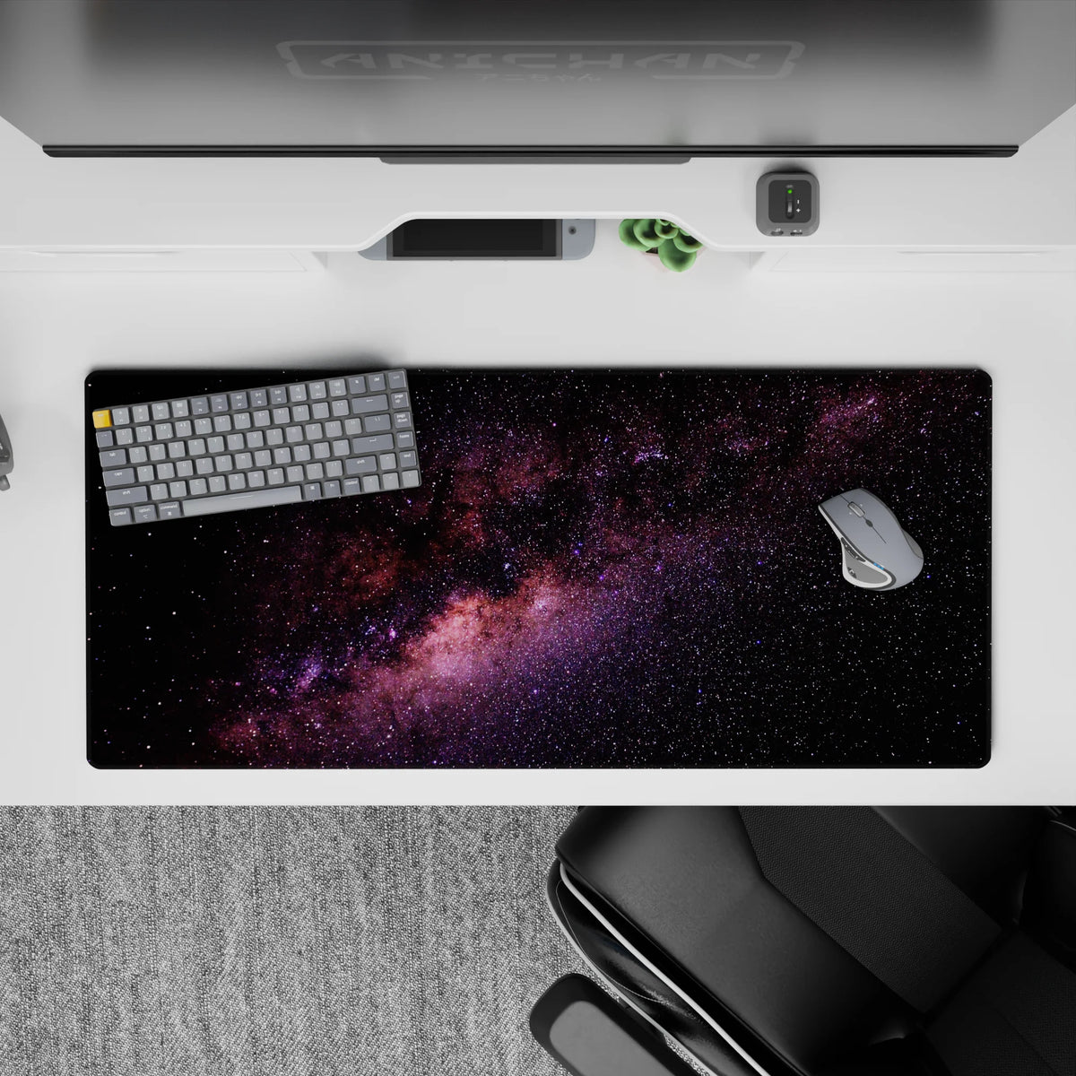 Calming inky black desk pad 36x16 inches with purple and blush nebula and stardust sparkle texture.