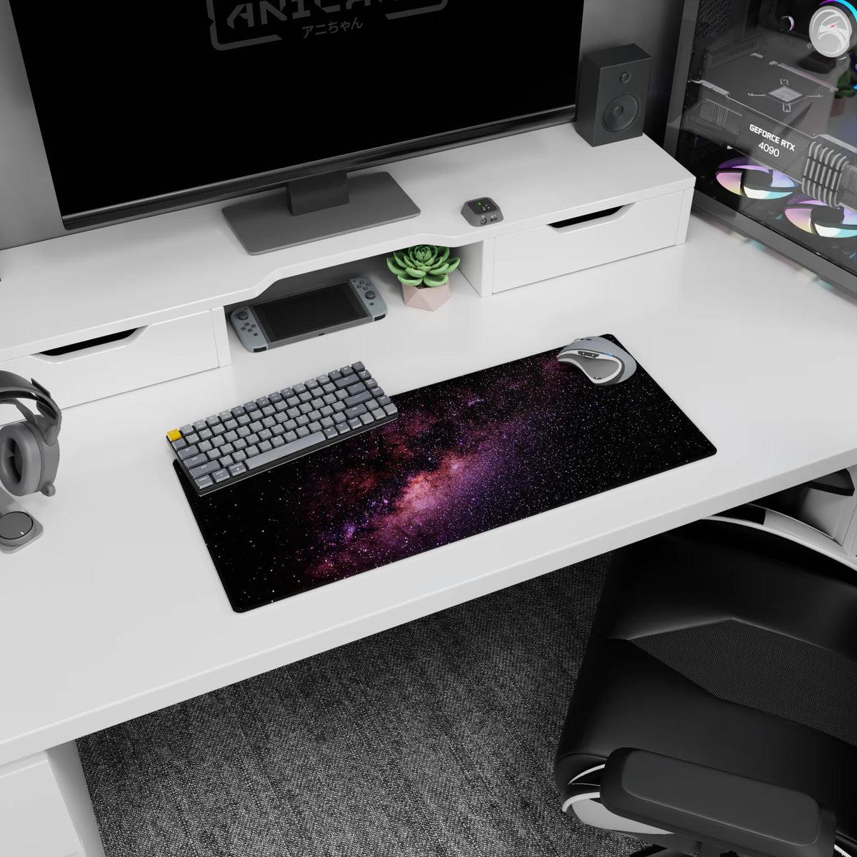 Night sky scene mouse pad 28x12 inches featuring a purple nebula ribbon across a star-speckled space field.