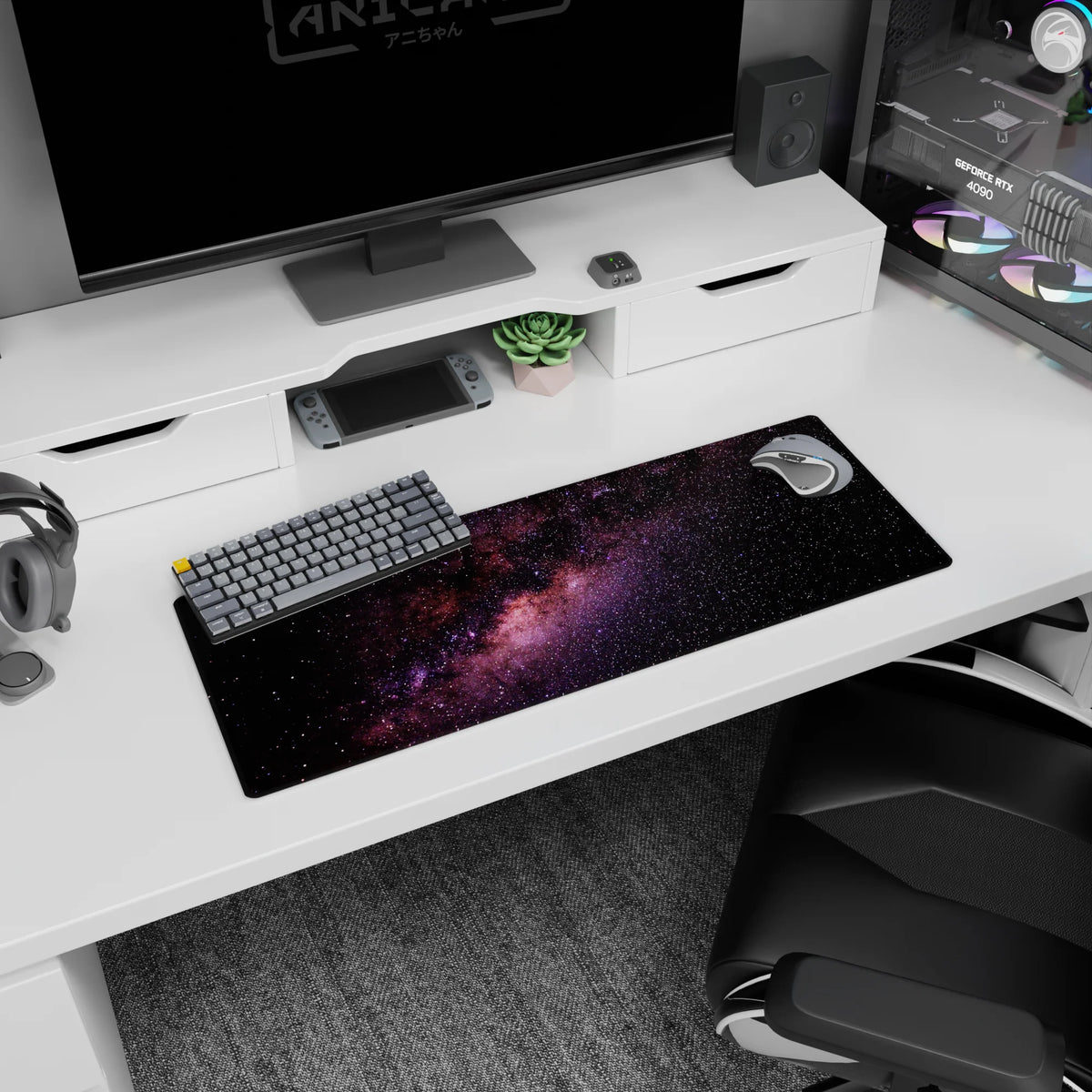Night sky scene 32x12 inches mouse pad featuring speckled stars and a ribbon-like nebula.