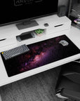 Starfield space scene desk pad 36x16 inches featuring a ribbon-like nebula across a black sky.