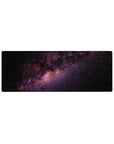 Galaxy desk mouse pad 32x12 inches with star-speckled space and nebula swirl design.