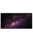Galaxy nebula desk mouse pad 32x16 inches with star-speckled space and stardust texture.