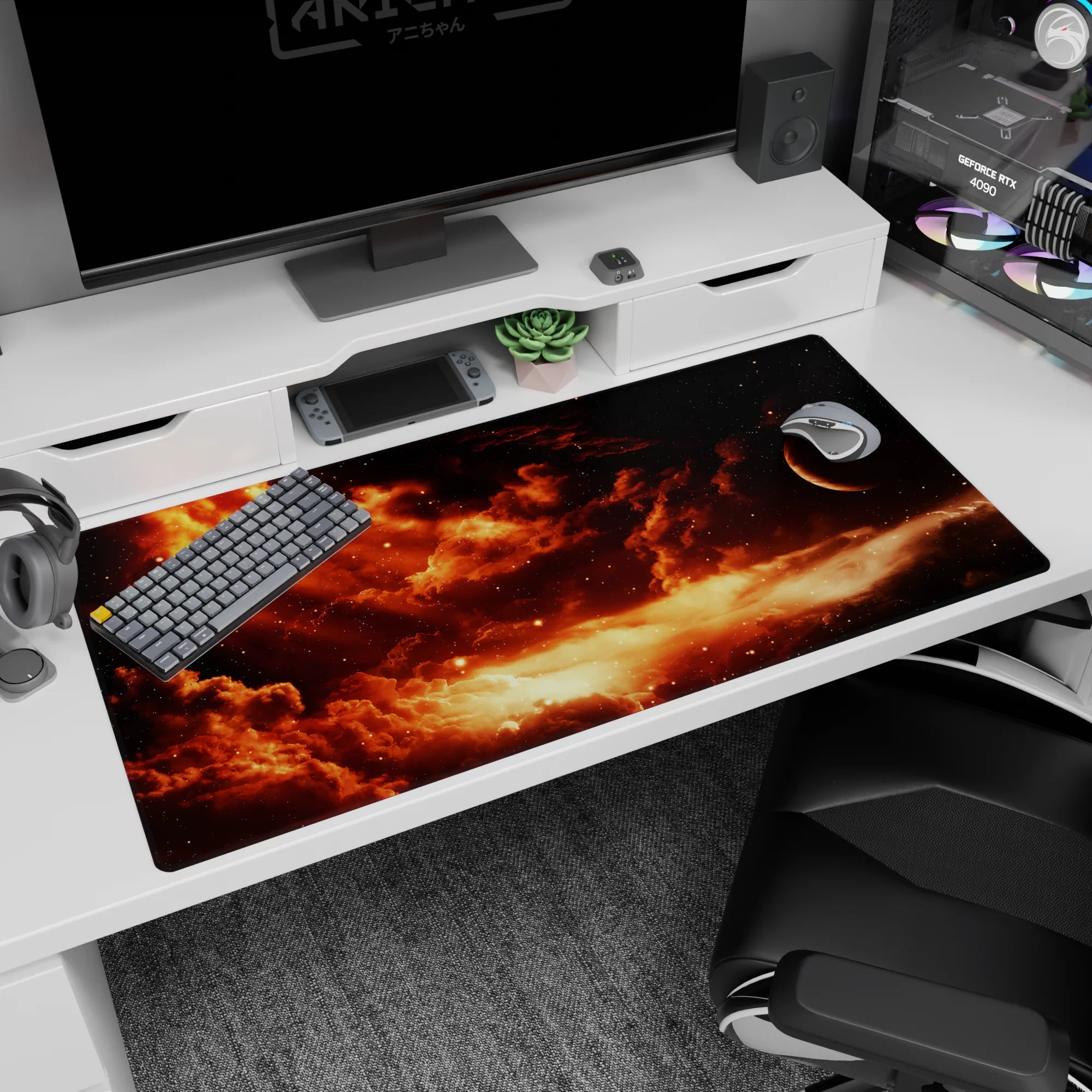 Desk pad showing a quiet planet beside swirling ember clouds and scattered stars, 40x20 inches.
