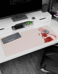 36x16 inches desk pad featuring a shy-smiling anime girl holding a knife, crisp silhouette on soft pink.