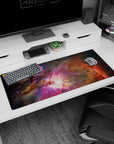 Space window desk pad 36x16 inches showing a cloudy nebula scene with a luminous center and shadowy edges.