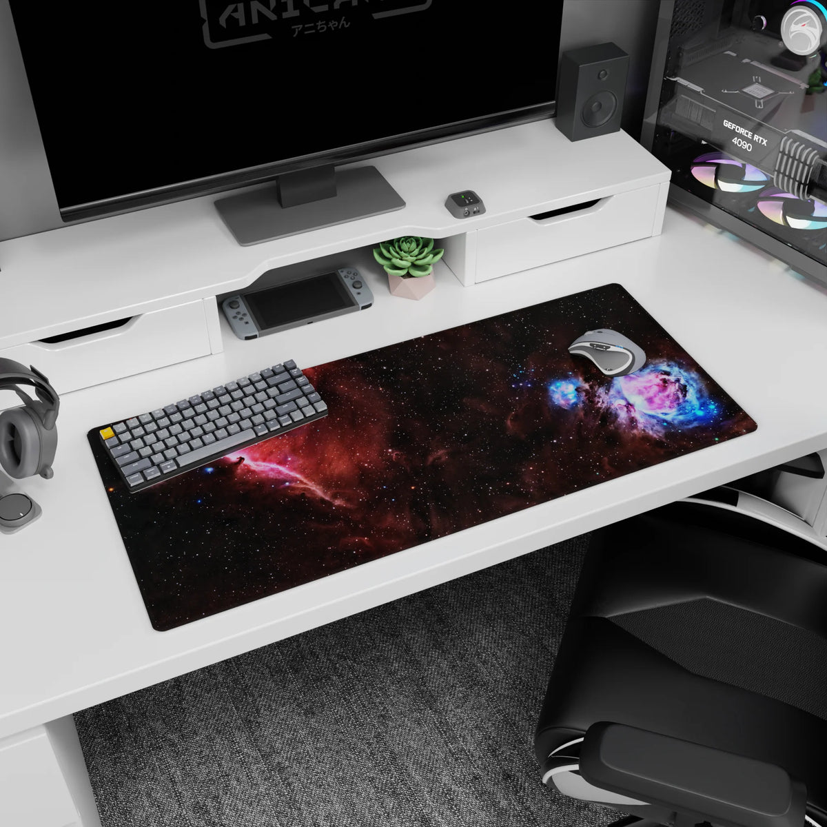 Nebula starfield desk pad 36x16 inches showing stardust scatter over smoky space clouds.