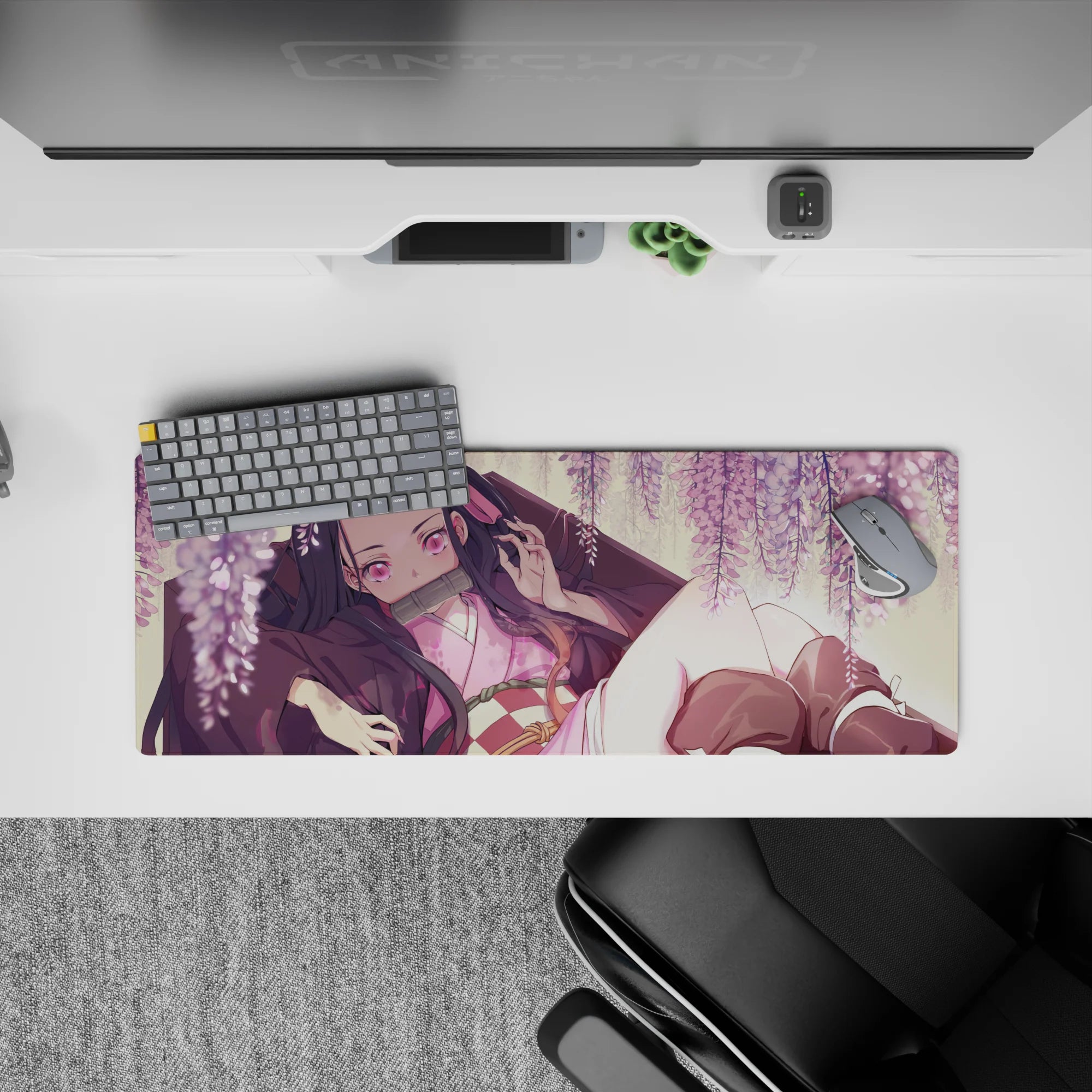 Nezuko from Demon Slayer on 32x12 inch anime mouse pad, surrounded by wisteria and blush-pink blooms, dreamy and magical.