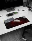 Moon drifting in a smoky starfield with deep red rings mouse pad, 28x12 inches.