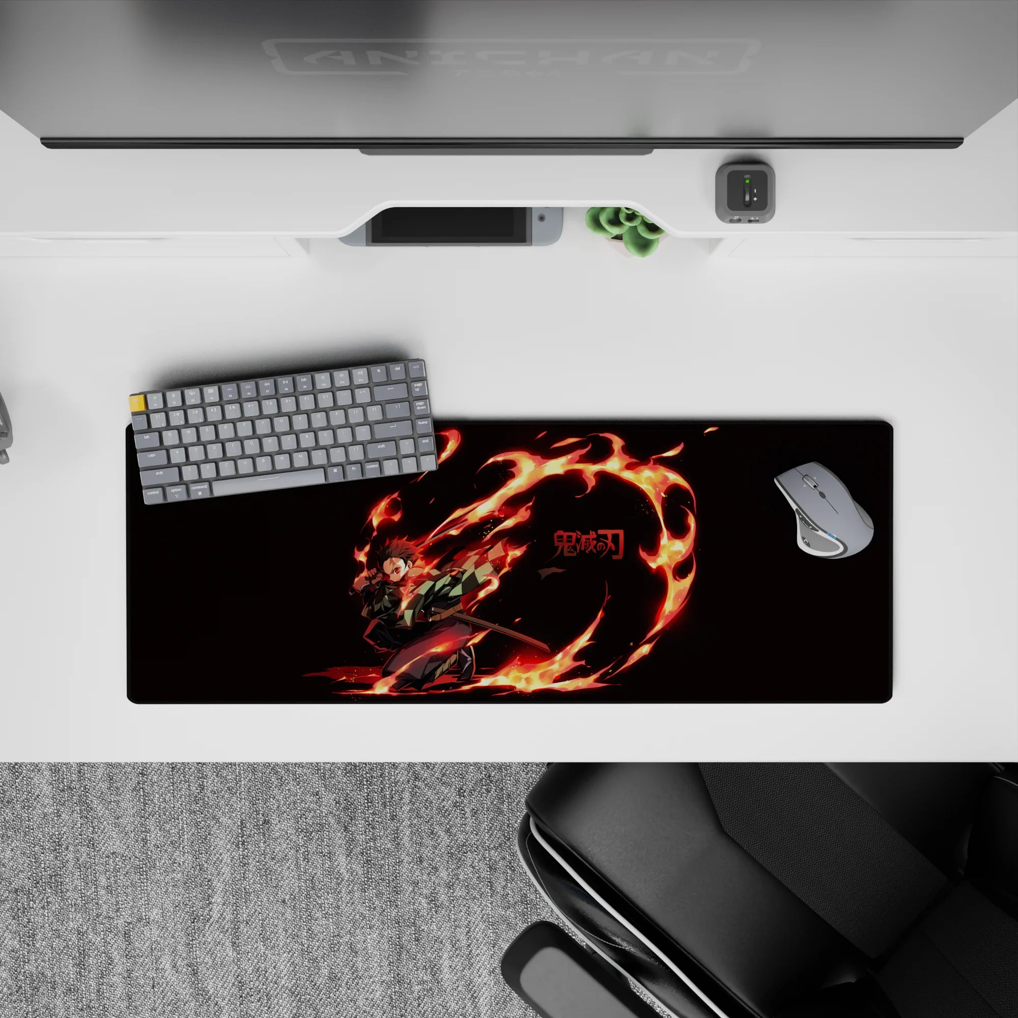 Tanjiro from Demon Slayer on a 32x12 inch mouse pad; fiery dance with glowing red eyes and vibrant flame ring against black.
