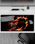 Tanjiro Demon Slayer anime mouse pad, 32x16 inches, showcasing fiery animation with vivid reds and oranges on a black background.