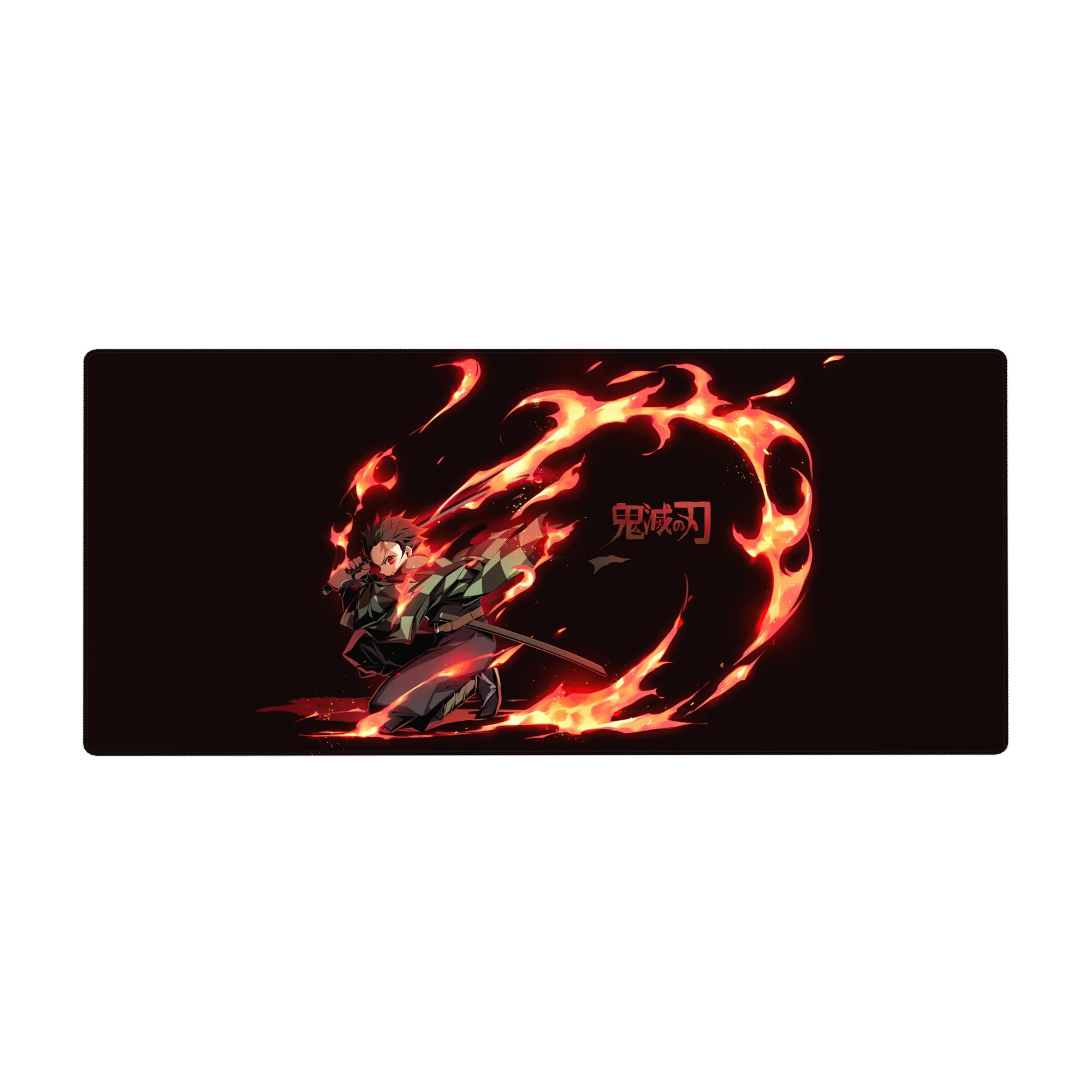 Tanjiro from Demon Slayer bursts into action on a 36x16 inch desk pad, vibrant with fiery oranges and reds against deep black.