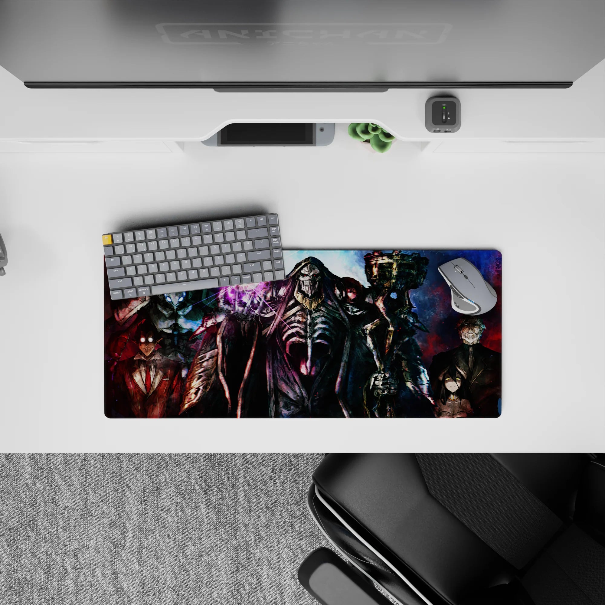 Anime mouse pad 28x12 inches featuring Ainz Ooal Gown and Nazarick Guardians, vibrant blues and reds, spellbinding art.