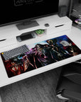 Anime desk pad 36x16 inches featuring Ainz Ooal Gown and Nazarick Guardians in vivid blues and reds, exuding power.