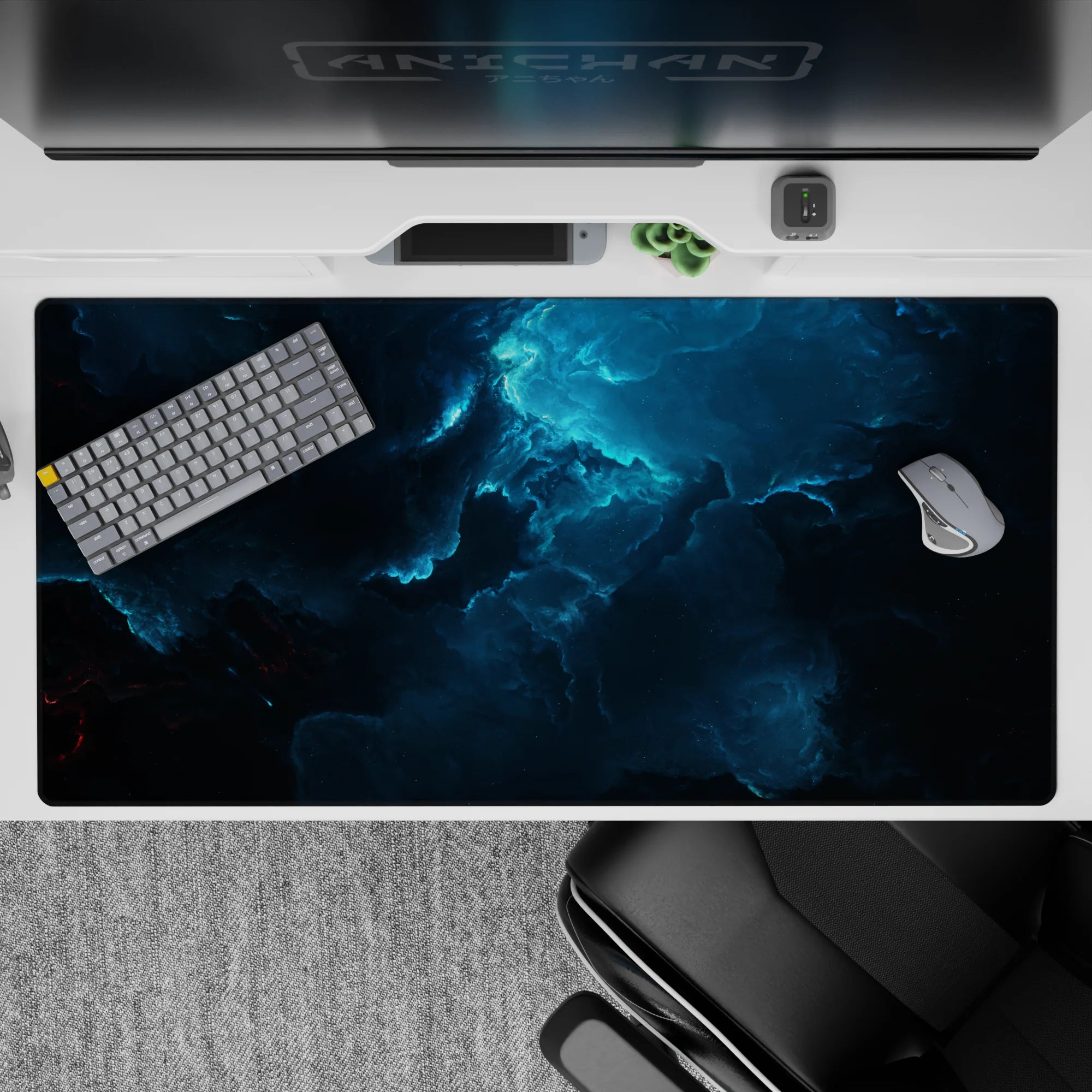 Deep ocean blues and smoky teals with near-black shadows, calming dramatic desk pad 40x20 inches.