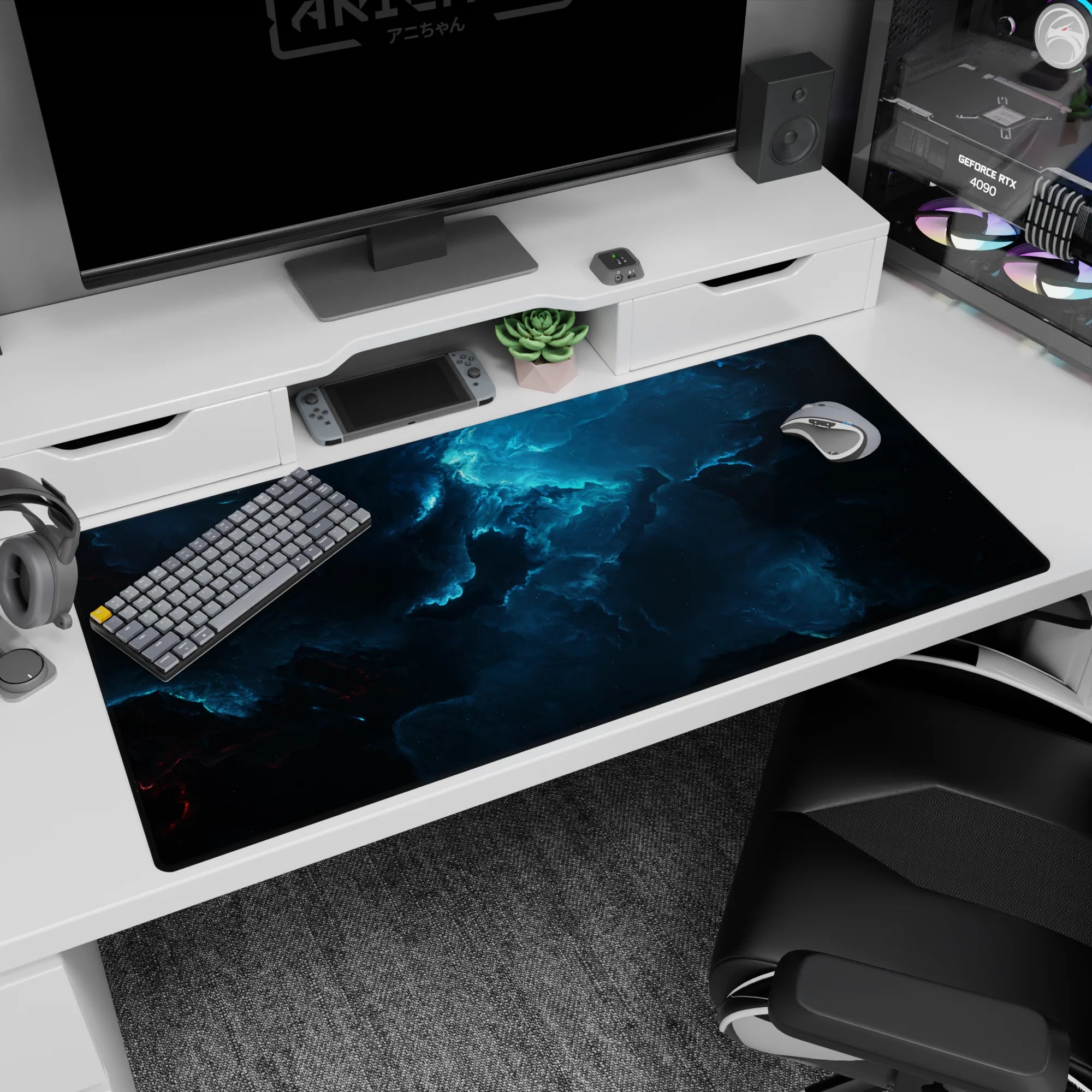 Midnight sky storm swirls with glowing cyan edges across a large desk pad, 40x20 inches.
